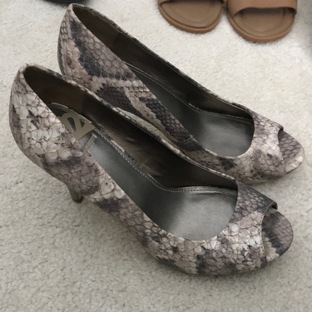 Women’s Fergalicious open-toed dress heel.
